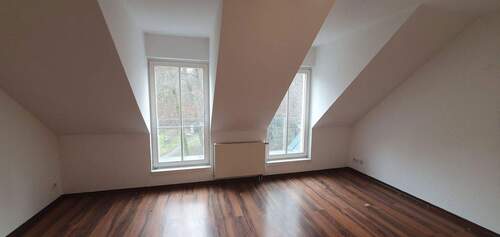 Wohnbereich zum Garten - 1 Zimmer Etagenwohnung in Woltersdorf