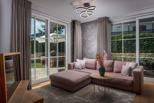 Gartenwohnung - Luxuriöse Ferienwohnung mit Garten am Tegernsee - mit Vermietungsservice