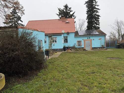 Rückseite Haus mit Veranda - Einfamilienhaus mit 150,00 m&sup2; in Alt Tucheband zum Kaufen