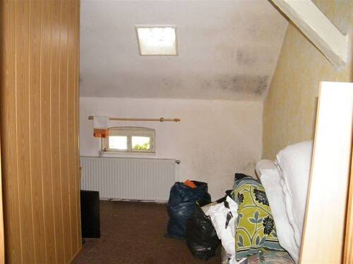 Zimmer im Dachgeschoss - 