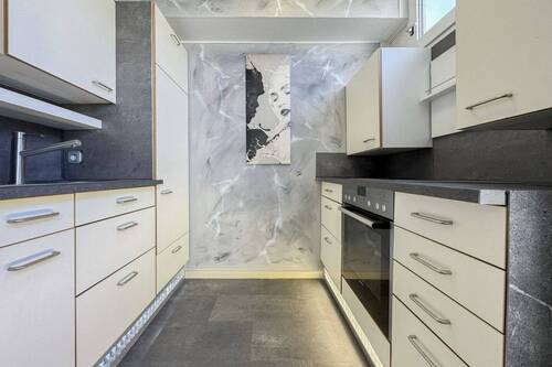 Küche - Renovierte 1-Zimmer-Wohnung mit Tiefgaragenstellplatz in gut angebundener Lage