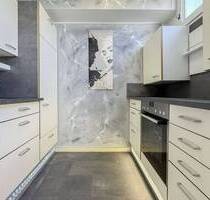 Renovierte 1-Zimmer-Wohnung mit Tiefgaragenstellplatz in gut angebundener Lage - Nürnberg St Peter