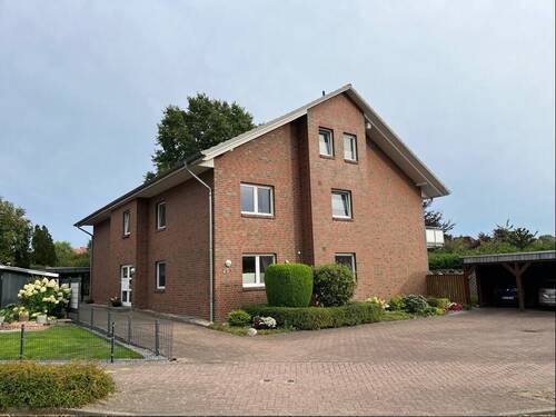 Straßenansicht - Mehrfamilienhaus, Wohnhaus zum Kaufen in Schneverdingen