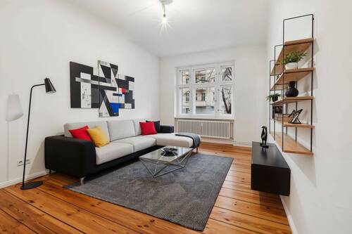 Wohnzimmer - (KI generiert) - 3 Zimmer Etagenwohnung zum Kaufen in Berlin