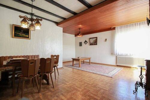 Wohnzimmer - 5 Zimmer Einfamilienhaus zum Kaufen in Hünstetten