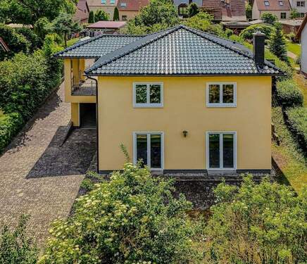 Blick aus dem Garten - Einfamilienhaus mit 143,30 m&sup2; in Schwielowsee zum Kaufen