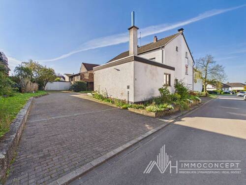 Straßenansicht links - 5 Zimmer Doppelhaushälfte zum Kaufen in Wittlich / Wengerohr