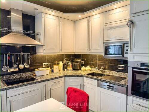 Küche mit kleinem Sitzplatz - Doppelhaushälfte mit 105,10 m&sup2; in Garding zum Kaufen