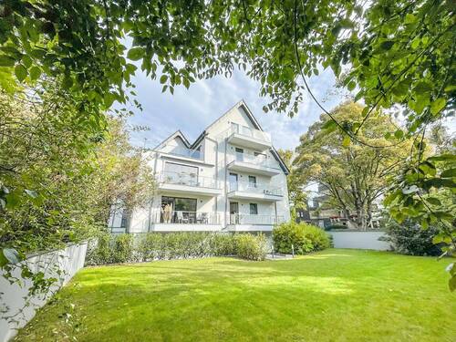 Gartenansicht - Exklusive Eigentumswohnung in direkter Rheinlage mit Blick ins Grüne