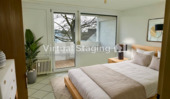 Schlafzimmer mit Zugang zum Balkon KI - 