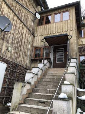 Aussenansicht Eingang - 1 Zimmer Mehrfamilienhaus, Wohnhaus zum Kaufen in Sülzhayn