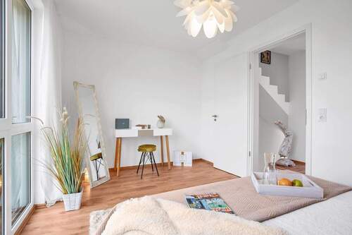 Schlafzimmer - Wohnen am Wasser: Die letzte Neubau-Einheit mit Dachterrasse, Garten & KfW-Vorteilen