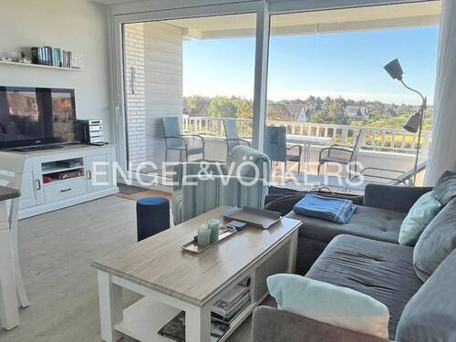 Wohn-/Essraum mit Blick zum Balkon - 2 Zimmer Etagenwohnung zum Kaufen in Wenningstedt