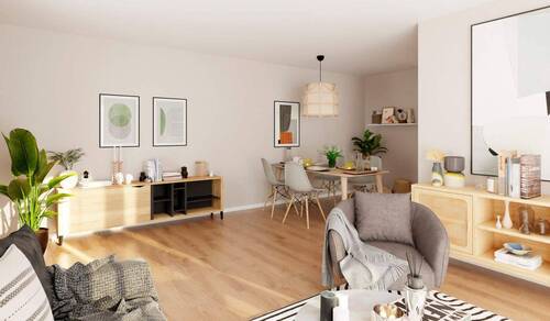 Wohnbereich mit Couch und Essecke - Barrierefreie Eigentumswohnung mit zwei Terrassen und eigenem Garten