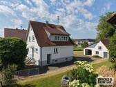 Haus Ansicht 02 - Gelegenheit in Jedesheim: Solides Einfamilienhaus zur direkten Übernahme - Jetzt Potenzial sichern!