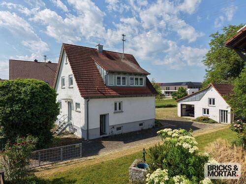 Haus Ansicht 02 - Gelegenheit in Jedesheim: Solides Einfamilienhaus zur direkten Übernahme - Jetzt Potenzial sichern!