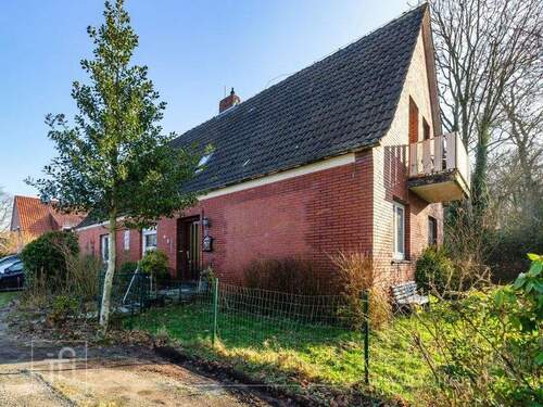 Aussenansicht Straßenseite - 9 Zimmer Einfamilienhaus zum Kaufen in Moormerland