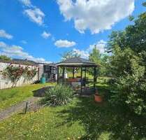 Garten, Einfamilienhaus und Garage im Mittelfeld der Hansestadt Anklam