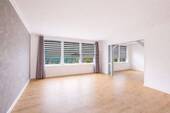 Wohnzimmer für gemeinsame Stunden - 6 Zimmer Mehrfamilienhaus, Wohnhaus zum Kaufen in Bleckede