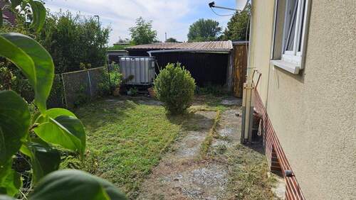 Garten am Hausgiebel.jpg - 3 Zimmer Reihenendhaus zum Kaufen in Anklam