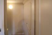 Flur mit Einbauschrank im Dachgeschoss - 