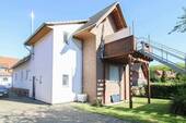 Seitenansicht - Großzügiges Zweifamilienhaus mit Einliegerwohnung, Garten & viel Potenzial in Auhagen