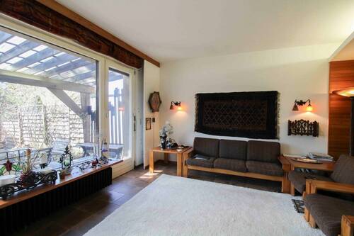 Wohnbereich mit Panoramafenster - Einfamilienhaus in Berlin zum Kaufen