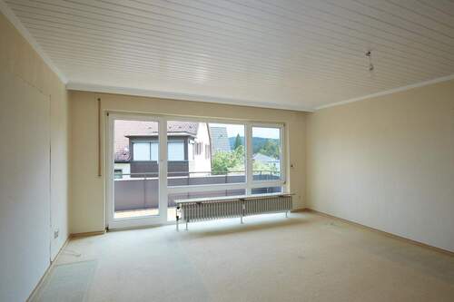 Wohn-/Esszimmer und Balkon - 