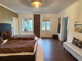Schlafzimmer im Erdgeschoss - 