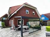 Gartenansicht mit Terrassenüberdachung - 5 Zimmer Einfamilienhaus in Greven