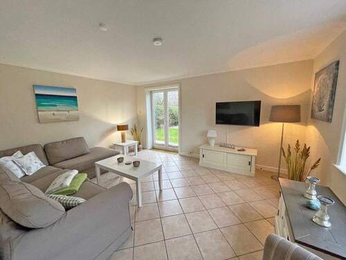 Wohnraum mit Terrassentür in den Garten - Doppelhaushälfte mit 160,00 m&sup2; in List zum Kaufen