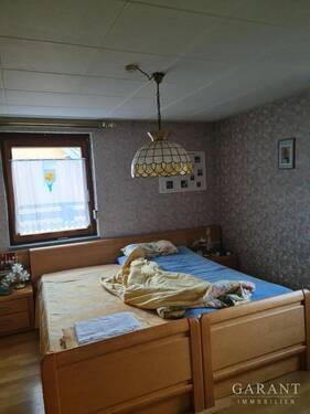 Schlafzimmer - Einfamilienhaus mit 130,00 m² in Seelbach zum Kaufen