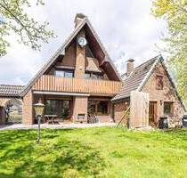 Charmantes Einfamilienhaus mit Wärmepumpe großem Südgrundstück und direkter Deichlage in Bremen-Grolland