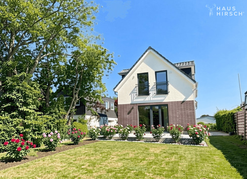 Außenansicht - Einzug ins Glück: Ihr Neubau Familiennest mit großer Terrasse und sonnigem Westgarten