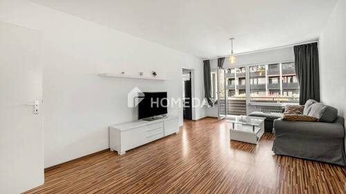 Wohnzimmer 1 - Helle 2-Zimmer-Wohnung mit Loggia und TG-Stellplatz