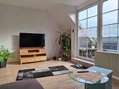 Teilansicht Wohnzimmer - Etagenwohnung mit 65,00 m² in Hohenlockstedt zum Kaufen