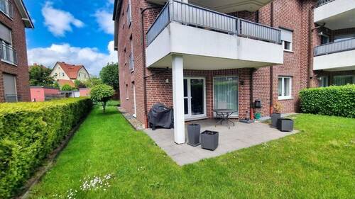 Garten - Attraktive 4-Zimmer-Eigentumswohnung im Erdgeschoss mit Terrasse, Südgarten und Garage