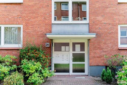 4 Eingangsportal - Etagenwohnung mit 86,60 m² in Flensburg zum Kaufen