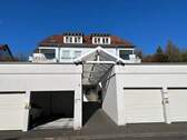 Ansicht mit Garage - 2 Zimmer Etagenwohnung in Bad Schwalbach