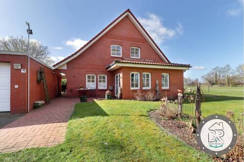 Charmantes Rotklinkerhaus mit gepflegtem Eingangsbereich und Auffahrt - 8 Zimmer Einfamilienhaus zum Kaufen in Loxstedt