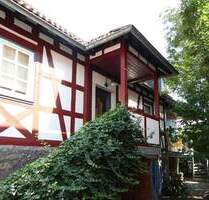 AUMÜLLER-Immobilien - Charmantes Einfamilienhaus aus baubiologischen Materialien mit Balkon und Hoffläche - Langenselbold