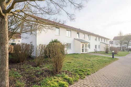 Außenansicht - +++ Grüne, ruhige Siedlungslage! - Gepflegte 3-Zimmer-Wohnung mit Süd-Balkon und TG-Stellplatz +++