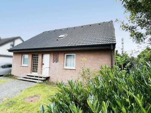 Straßenansicht - Hauseingang - 6 Zimmer Einfamilienhaus zum Kaufen in Greven