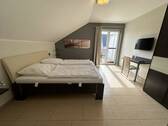 Schlafzimmer II im Dachgeschoss - 
