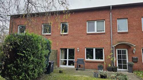 Wohnungseingang mit Terrasse - 2 Zimmer Mehrfamilienhaus, Wohnhaus in Greven