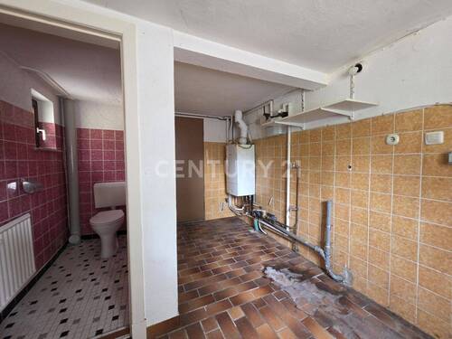 Heizung/Durchgang zur Garage - 