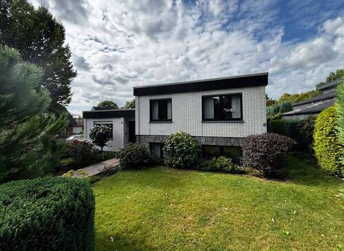 Vorgarten - Einfamilienhaus mit 128,60 m² in Ibbenbüren zum Kaufen