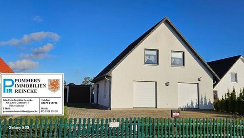 Haus und Garage.jpg - 4 Zimmer Einfamilienhaus in Anklam