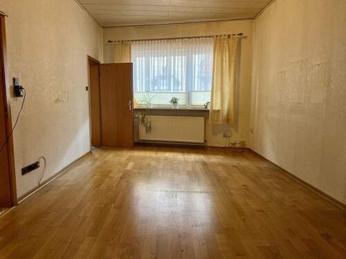 Wohnzimmer - Einfamilienhaus mit 127,00 m&sup2; in Heide zum Kaufen
