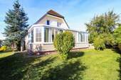 Außenansicht Wintergarten - 8 Zimmer Einfamilienhaus zum Kaufen in Groß Pankow (Prignitz)
